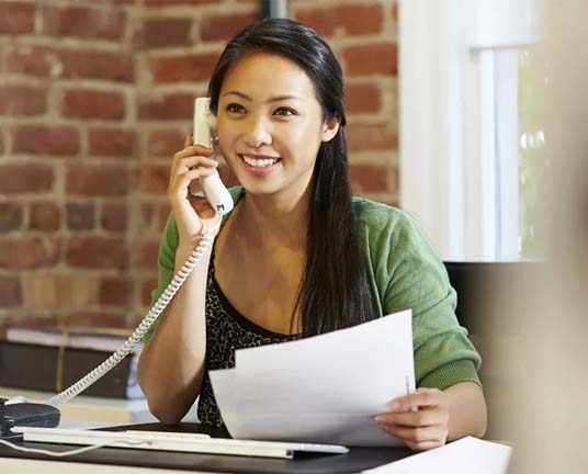 contact-us-account-manager-woman-on-phone-helping-clients