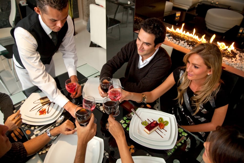 Group of people at a restaurant having dinner